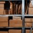 Retail employee organizing seasonal inventory inside an onsite storage container.